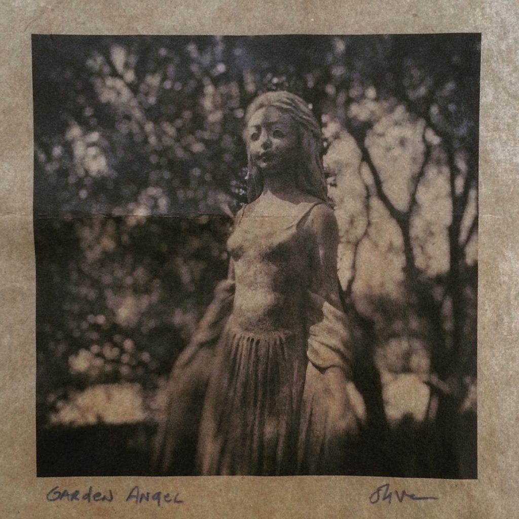 garden angel, fine art photography on recycled paper by Oliver Tollison